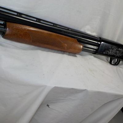 Revelation 12 gauge pump Shotgun (Mossberg) 2 3/4 & 3in shells. est $200 to $400.