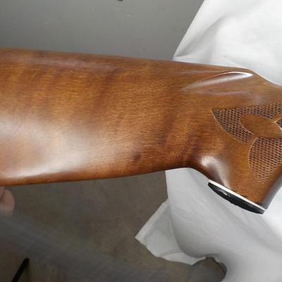 Revelation 12 gauge pump Shotgun (Mossberg) 2 3/4 & 3in shells. est $200 to $400.