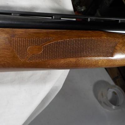 Revelation 12 gauge pump Shotgun (Mossberg) 2 3/4 & 3in shells. est $200 to $400.