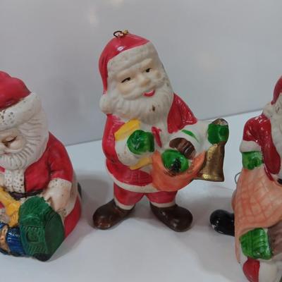 Five Ceramic Santa ornaments