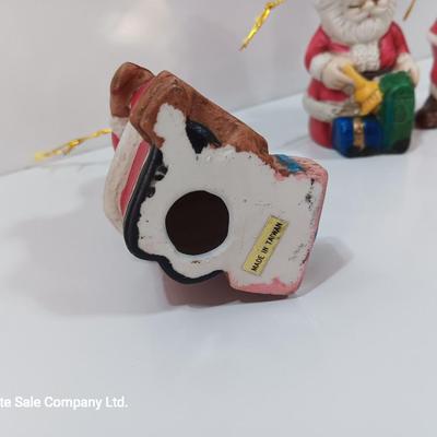Five Ceramic Santa ornaments