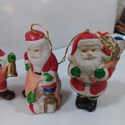 Five Ceramic Santa ornaments