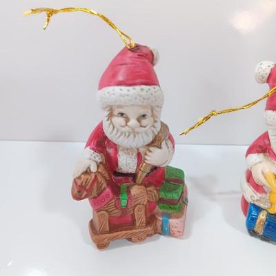 Five Ceramic Santa ornaments
