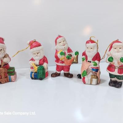 Five Ceramic Santa ornaments