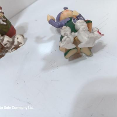 Three vintage Hallmark ornament girls