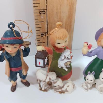 Three vintage Hallmark ornament girls