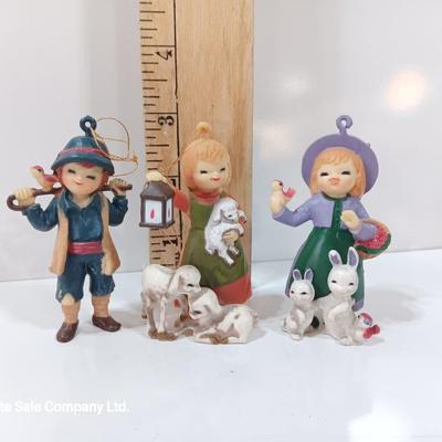 Three vintage Hallmark ornament girls