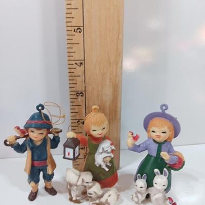 Three vintage Hallmark ornament girls
