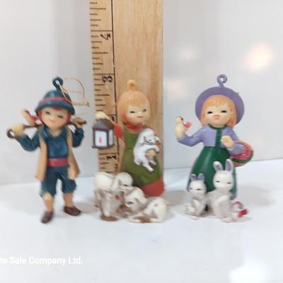 Three vintage Hallmark ornament girls