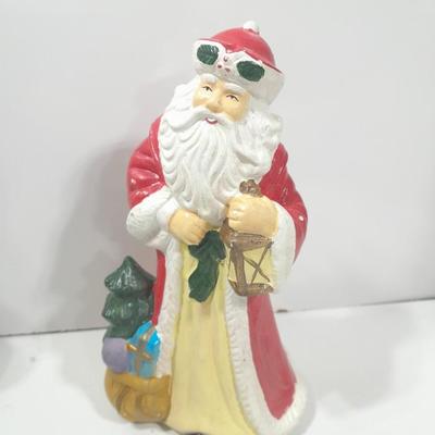Ceramic Santa with two matching Santa candle stick holders