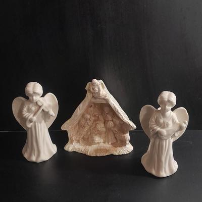 Two porcelain Angel candle holders and a vintage porcelain nativity scene