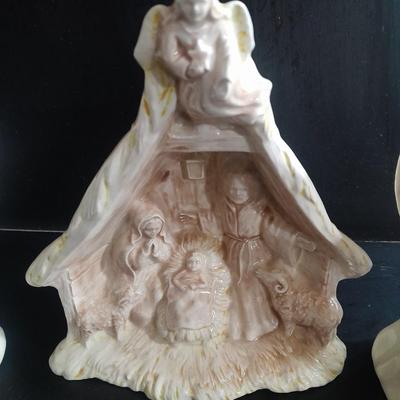 Two porcelain Angel candle holders and a vintage porcelain nativity scene