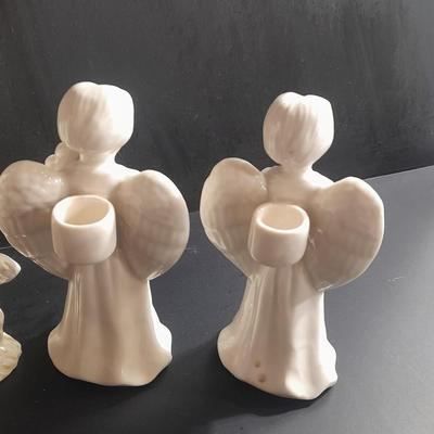 Two porcelain Angel candle holders and a vintage porcelain nativity scene