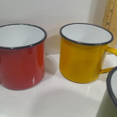 Four Colorful enamel ware metal mugs
