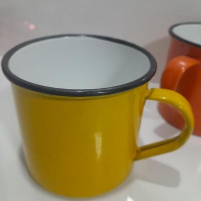 Four Colorful enamel ware metal mugs