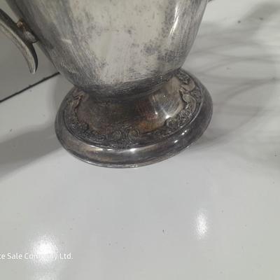 Roger's & Bro 2301 pitcher and a Studio Silversmiths metal basket