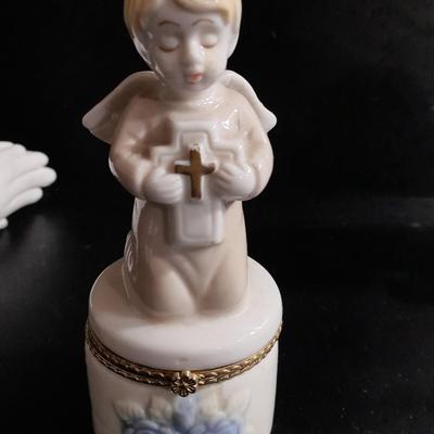Porcelain praying hands with small ring box with religious angel on top