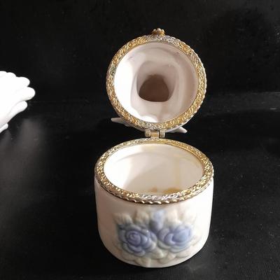 Porcelain praying hands with small ring box with religious angel on top