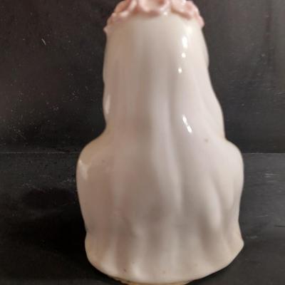 Porcelain praying hands with girl with flowers in her hands