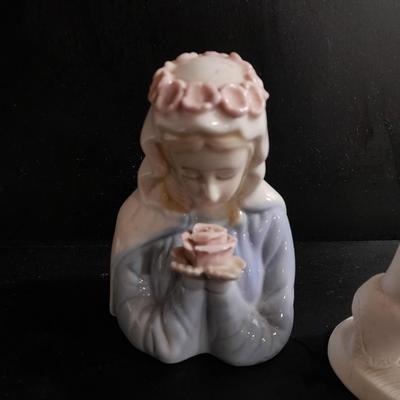 Porcelain praying hands with girl with flowers in her hands