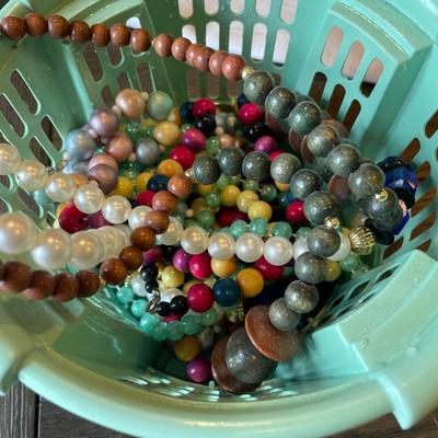 Small basket of beaded necklaces