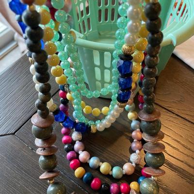 Small basket of beaded necklaces