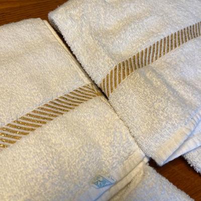 White with gold towels
