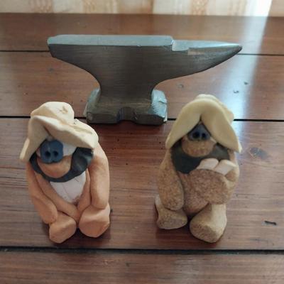 GOOFY CLAY FIGURES AND A MINIATURE LEAD ANVIL