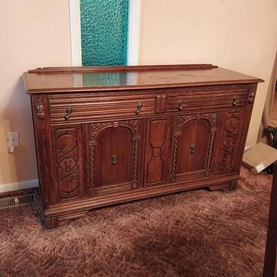 SOLID WOOD BUFFET WITH HAND CARVINGS