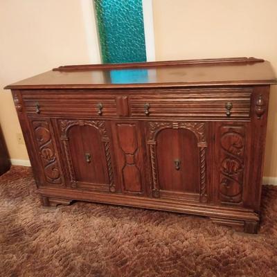 SOLID WOOD BUFFET WITH HAND CARVINGS