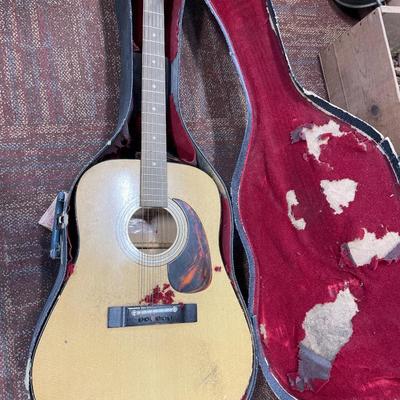 Harmony acoustic guitar and case