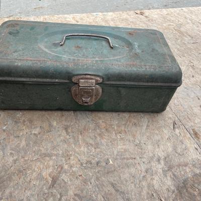 Small green tool box with tools