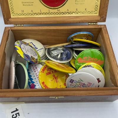 Bering cigar box full of buttons