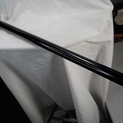 Walking Cane-sword with pull out/ 36 in. / 17 in sword..est. $50 to $150.