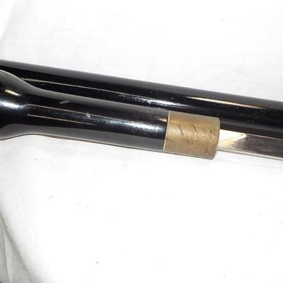 Walking Cane-sword with pull out/ 36 in. / 17 in sword..est. $50 to $150.