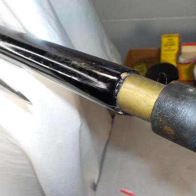 Walking Cane-sword with pull out/ 36 in. / 17 in sword..est. $50 to $150.