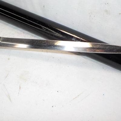 Walking Cane-sword with pull out/ 36 in. / 17 in sword..est. $50 to $150.
