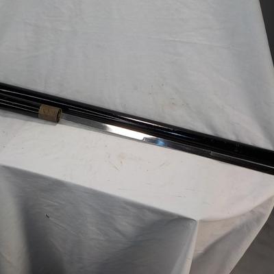 Walking Cane-sword with pull out/ 36 in. / 17 in sword..est. $50 to $150.