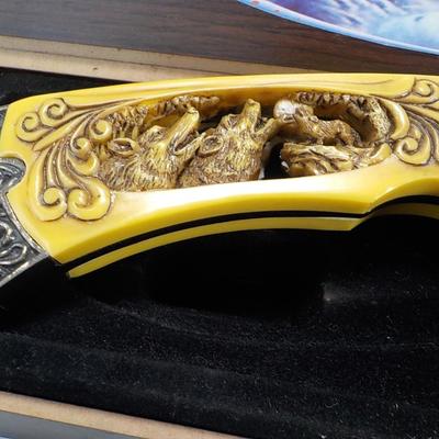 10 in fixed blade wolf decor blade is 400 ga. / China. $15 to $30.
