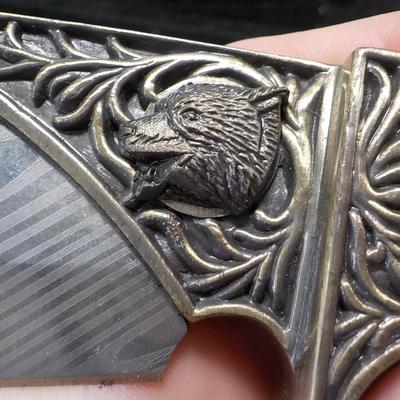 10 in fixed blade wolf decor blade is 400 ga. / China. $15 to $30.