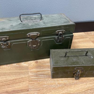 2 green tool boxes