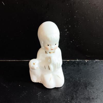 Porcelain religious figures -- Nunn -- girl praying with sheep -- and lady holding child.