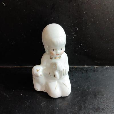 Porcelain religious figures -- Nunn -- girl praying with sheep -- and lady holding child.