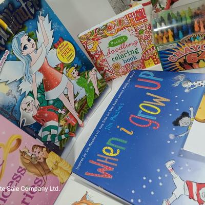 Variety of Children's books. Coloring booklet and crayons