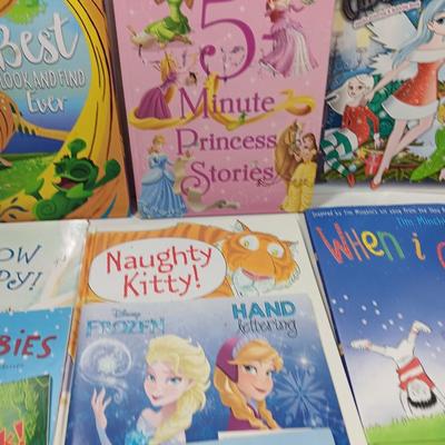 Variety of Children's books. Coloring booklet and crayons
