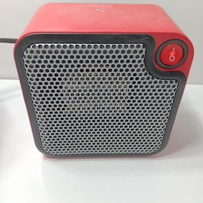 Matching red Uline Vornado Desk top fan and a Mainstays desk top heater