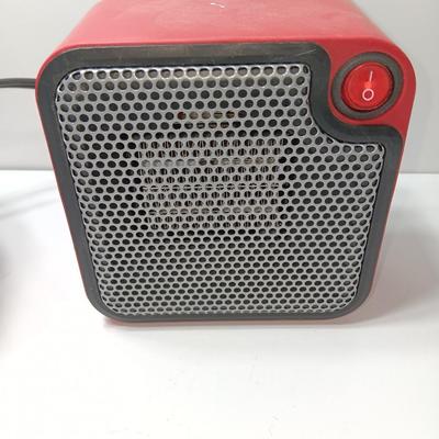Matching red Uline Vornado Desk top fan and a Mainstays desk top heater