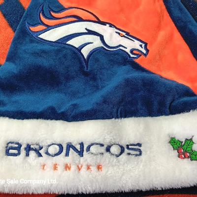 Denver Bronco's Back-to-Back Superbowl coca cola bottles in case with a Bronco's towel and Christmas hat