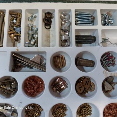 Metal box full of Wesklock keying kit hardware