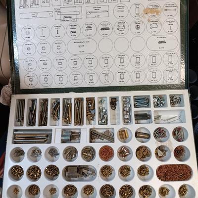 Metal box full of Wesklock keying kit hardware